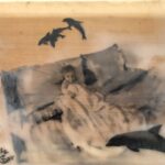 black and white image of a baby looking very small tucked neatly under a blanket and reclining against the large pillows of a king-sized bed, staring out to the side with a foggy haze surrounding the bed and dolphins, one in the foreground and three behind the bed, jumping up out of what seems to be the ocean surrounding the bed; the image has a sepia appearance due to being tinted by the tan of the wood panel showing through